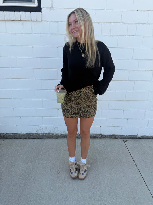 Willow leopard animal print mini skirt bows front pockets built-in shorts stretchy zip back