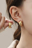 18K Stainless Steel Tarnish Free Crossed Huggie Gold Earrings 210 jewelry- Ella Chic BoutiqueJOSSLYN by wall to wall