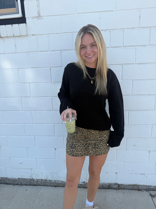Willow leopard animal print mini skirt bows front pockets built-in shorts stretchy zip back