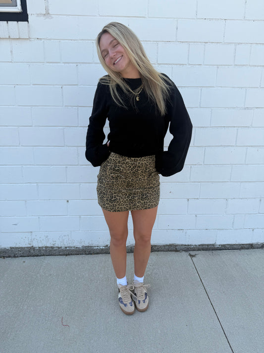 Willow leopard animal print mini skirt bows front pockets built-in shorts stretchy zip back