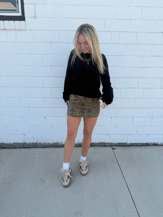 Willow leopard animal print mini skirt bows front pockets built-in shorts stretchy zip back
