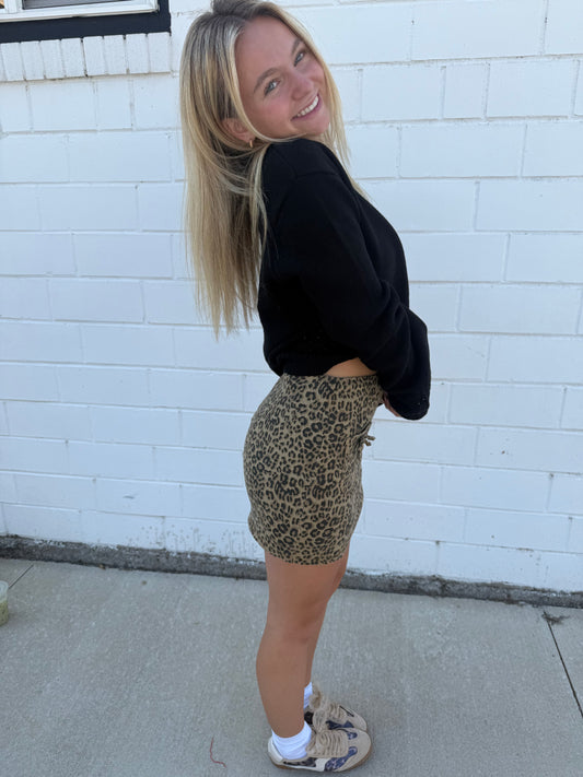 Willow leopard animal print mini skirt bows front pockets built-in shorts stretchy zip back set
