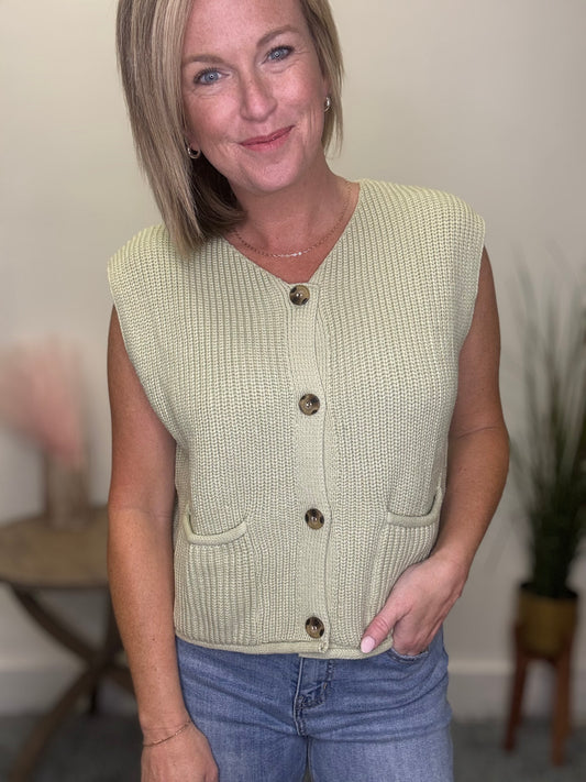 le lis light green sleeveless sweater vest big button front pockets top