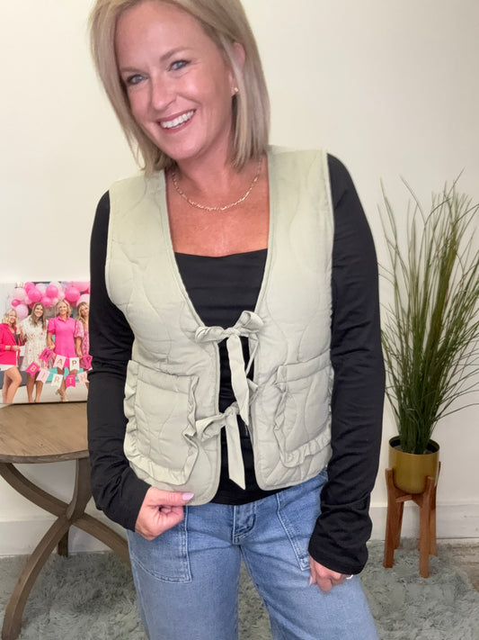 Sage Green Quilted Vest ruffle pockets tie front bow ties hyfve double zero