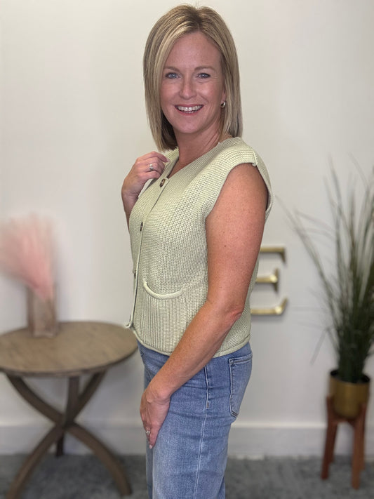 le lis light green sleeveless sweater vest big button front pockets top
