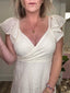 Wrap Front Flutter Sleeve Eyelet Dress in Ivory - FINAL SALE